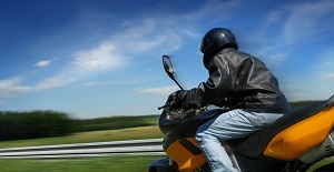 man riding a motorcycle